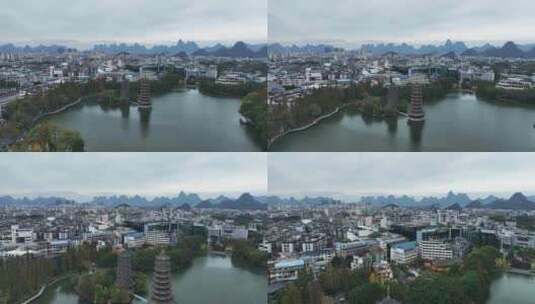 航拍广西省桂林市日月双塔文化公园城市风光高清在线视频素材下载