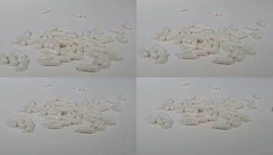 白色背景上的白色药丸高清在线视频素材下载