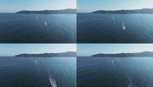 航拍三亚海棠湾亚龙湾蜈支洲岛海上运动游艇高清在线视频素材下载