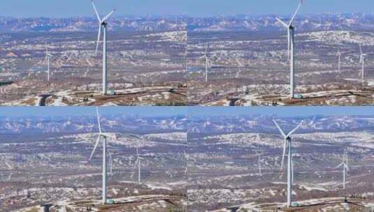 4k航拍河北承德雪后的塞罕坝林场风力发电高清在线视频素材下载