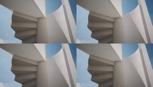 蓝天下的有艺术感的建筑结构高清在线视频素材下载