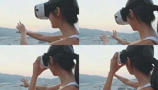 女人在户外用虚拟现实设备观看高清在线视频素材下载