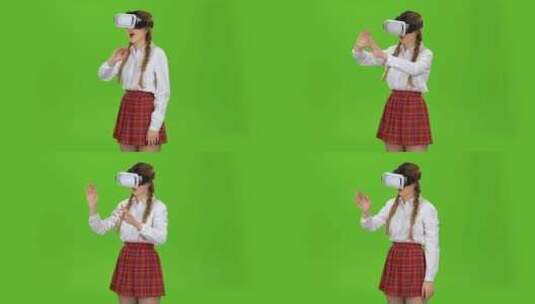 绿幕下戴虚拟眼镜的女孩高清在线视频素材下载