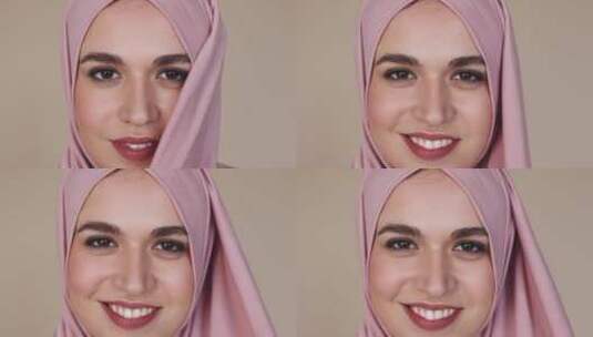带粉色头巾的女人微笑着高清在线视频素材下载