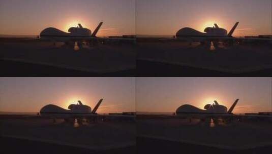 日出下正在维修的飞机高清在线视频素材下载