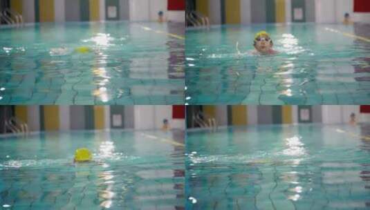 游泳池中练习游泳的中国女孩高清在线视频素材下载