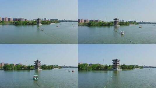 东莞航拍华阳湖湿地公园腾龙阁低飞前进高清在线视频素材下载
