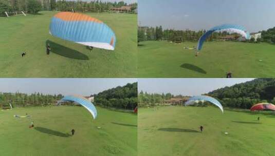 武汉滑翔伞基地航拍滑翔伞撑起过程709高清在线视频素材下载