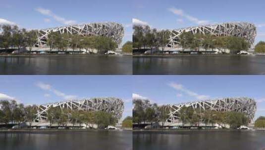 北京鸟巢建筑前的湖水高清在线视频素材下载