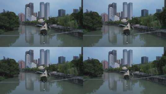 成华公园锦江高楼大厦熊猫走钢丝后飞高清在线视频素材下载