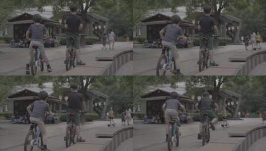孩子广场骑行娱乐高清在线视频素材下载