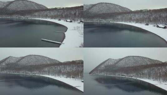 原创 日本北海道支笏湖岸冬天森林雪景航拍高清在线视频素材下载