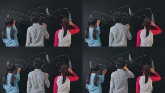 小学生们在黑板上画博士帽高清在线视频素材下载