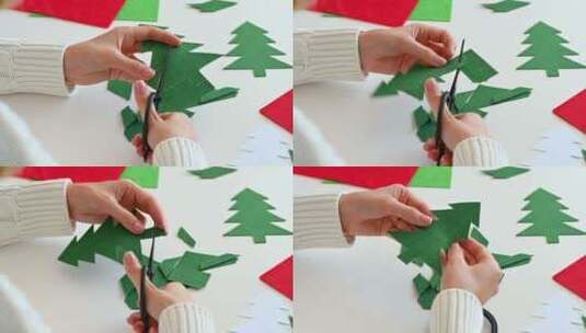 女人用剪刀剪出一棵圣诞树高清在线视频素材下载