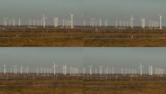 航拍海边的风力发电机组高清在线视频素材下载