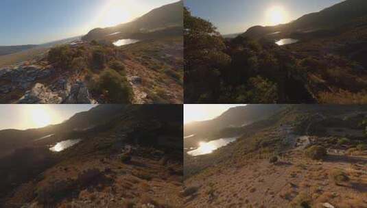 航拍夕阳下的山脉高清在线视频素材下载
