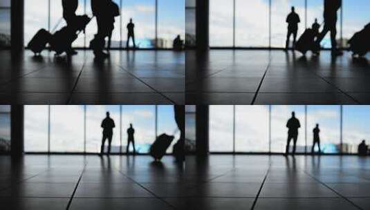 乘客在机场窗口前剪影高清在线视频素材下载