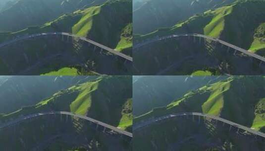 航拍新疆山谷中的公路高架桥高清在线视频素材下载