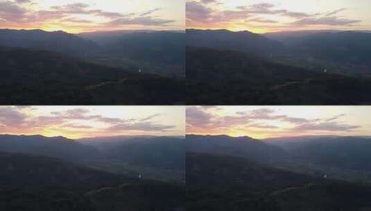 日落时山丘的鸟瞰图高清在线视频素材下载