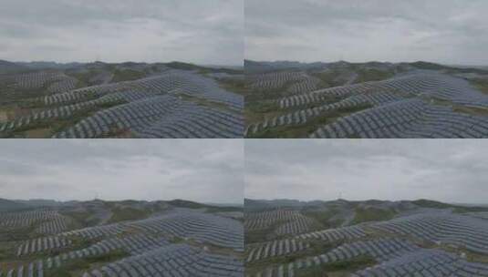 航拍山上的太阳能光伏发电站高清在线视频素材下载