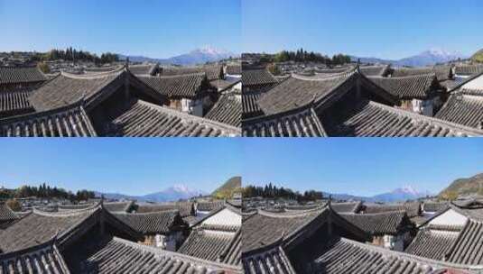 在丽江古城屋顶眺望远处的玉龙雪山高清在线视频素材下载
