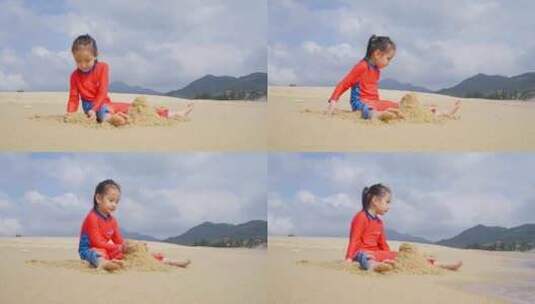 可爱小女孩在海南万宁海滩玩沙子高清在线视频素材下载