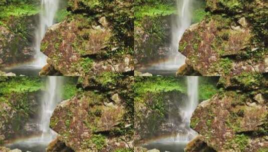 阳光照在桂林喀斯特山谷中的瀑布形成彩虹高清在线视频素材下载