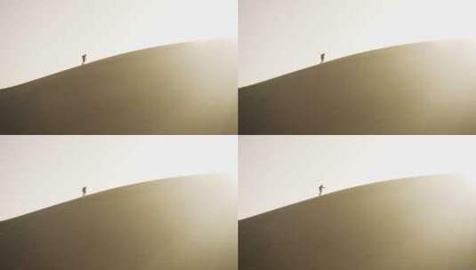 沙漠中的徒步旅行者高清在线视频素材下载