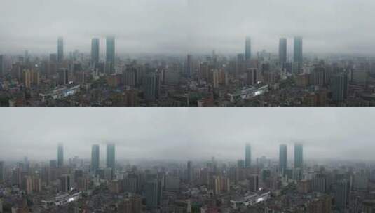 航拍长沙国金中心大楼阴雨天云雾缭绕高清在线视频素材下载