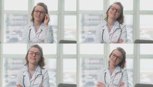 女医生扶眼镜抬头微笑高清在线视频素材下载