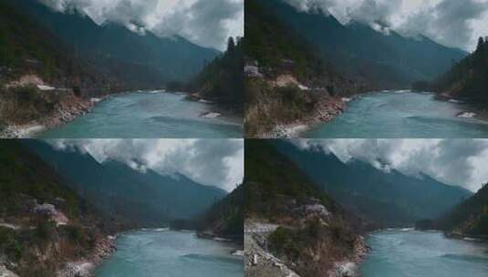 西藏旅游风光318国道林芝段蓝色河水云山高清在线视频素材下载