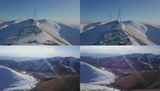 4K西藏5200雪山顶特高压立塔建设01高清在线视频素材下载