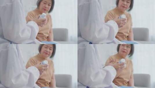 亚洲高级女病人在疗养院向内科护士咨询。高清在线视频素材下载