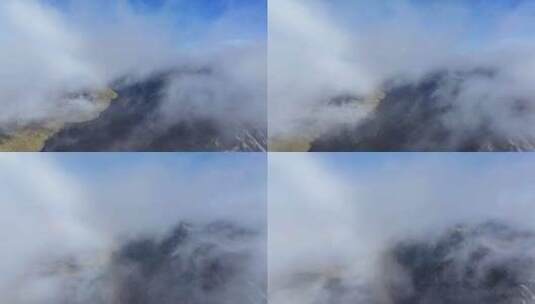 川西贡嘎山区乌库楚无人机穿云云雾风景高清在线视频素材下载