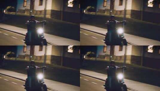 路灯下的摩托手高清在线视频素材下载
