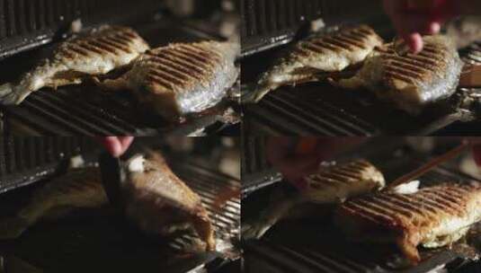用烤架烤鱼高清在线视频素材下载