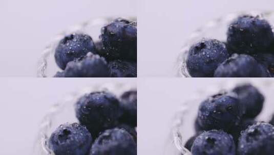 白背景蓝莓特写旋转高清在线视频素材下载