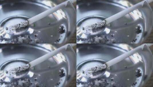 在烟灰缸中的香烟高清在线视频素材下载