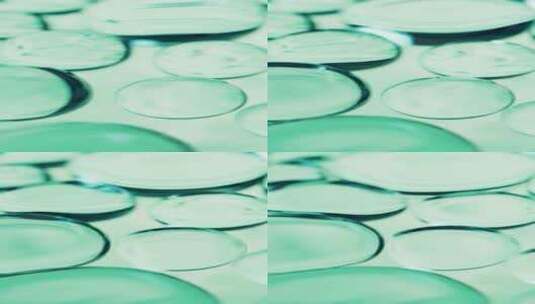 抽象绿色透明水珠玻璃球体背景3D渲染高清在线视频素材下载