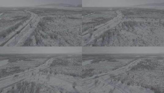 航拍汽车在雪地下行驶高清在线视频素材下载