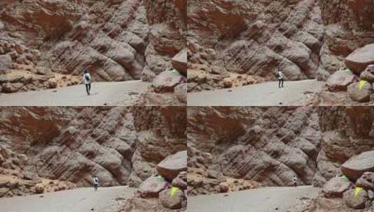天山大峡谷 一个人走路高清在线视频素材下载