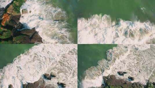 4K航拍大海汹涌海浪拍打礁石飞溅的浪花高清在线视频素材下载