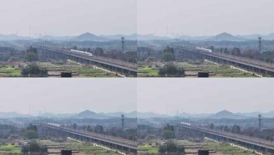高铁动车驶过田野村庄高清在线视频素材下载