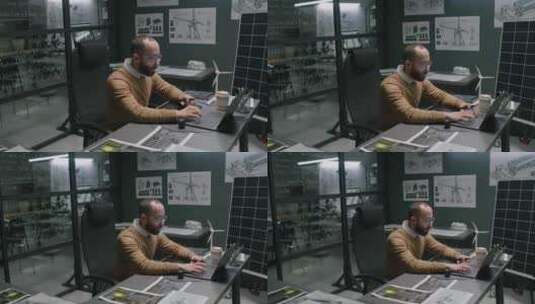 男性清洁能源专家晚上在办公室用笔记本电脑高清在线视频素材下载