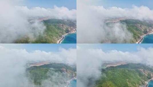 平流雾下的陡峭山悬崖和海岸线高清在线视频素材下载