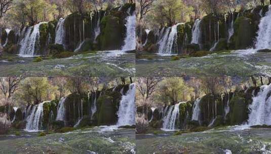 九寨沟箭竹海瀑布水中青苔流水岩石秋天水景高清在线视频素材下载