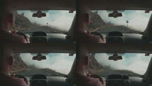 驾车行驶在一条火山路上高清在线视频素材下载