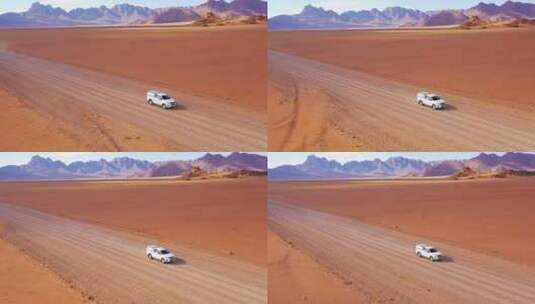 航拍一辆汽车行驶在沙漠公路上高清在线视频素材下载