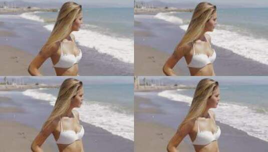 模特穿着泳装站在海边高清在线视频素材下载