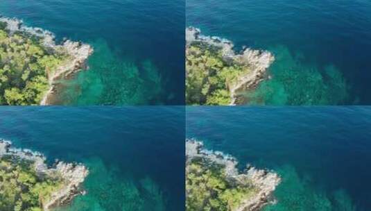 无人驾驶飞机在清澈的沿海水域上空飞行高清在线视频素材下载